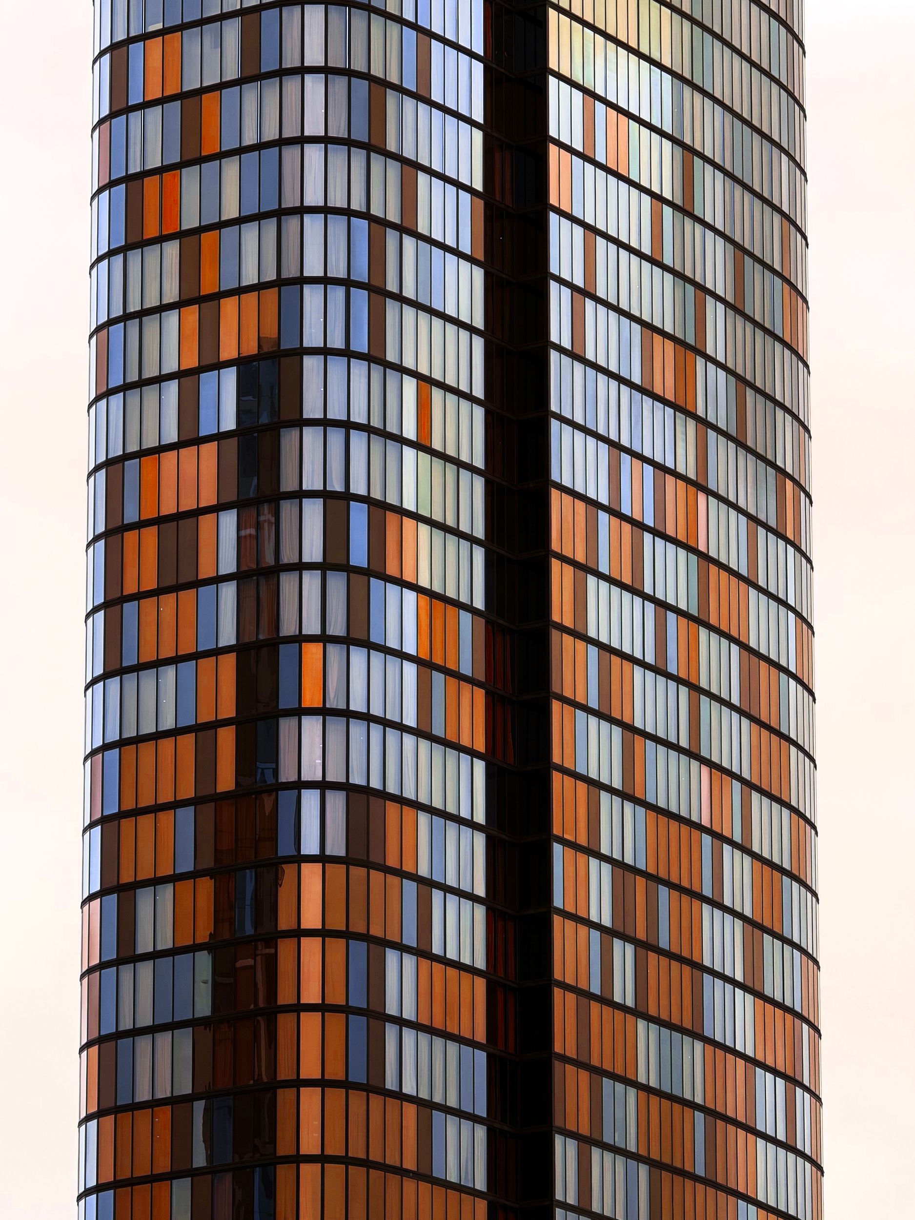 Architecture tower windows with maroon and blue colours by Matt Leane ...
